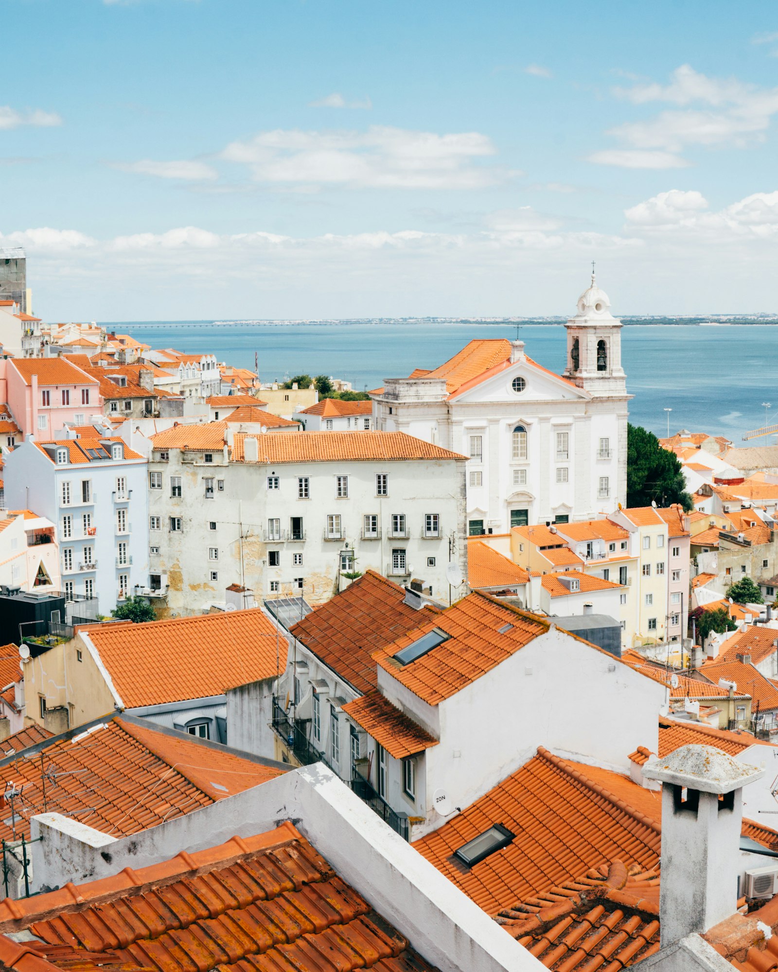 Orange roofs of Lisbon above the river